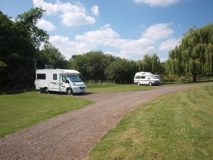 Motorhomes and caravans at Luccombes Fishery